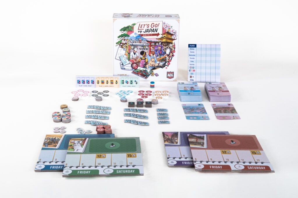 Contenido completo del juego de mesa familiar Let's Go! To Japan con tableros, cartas y fichas