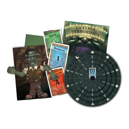 Componentes del juego EXIT La Feria Terrorífica con personaje Frankenstein, cartas y disco descodificador