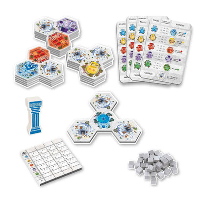 Componentes del juego Akropolis mostrando losetas hexagonales, marcadores y cubos de piedra