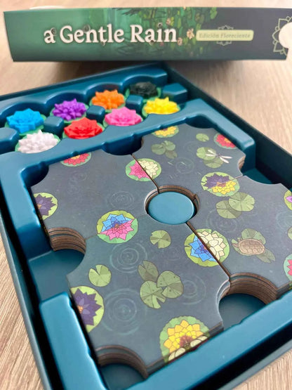 Contenido del juego A Gentle Rain Edición Floreciente con ocho flores 3D organizadas