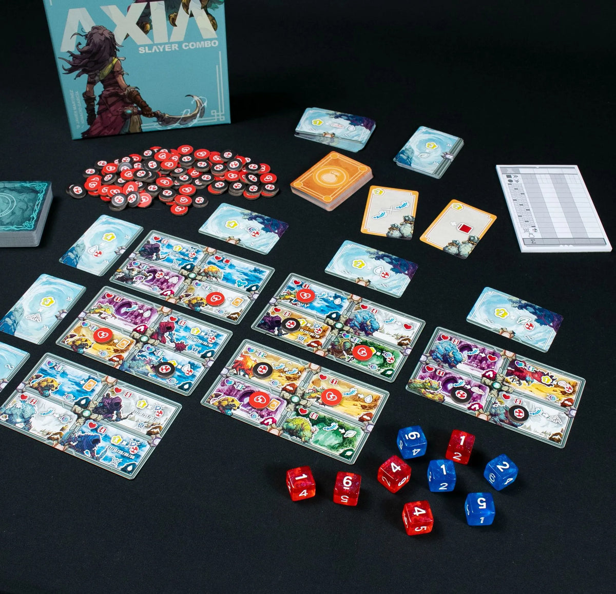 Juego completo Axia Slayer Combo desplegado con cartas y dados