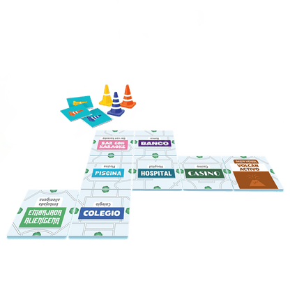 Fichas de edificios y conos del juego cooperativo Link City sobre tablero