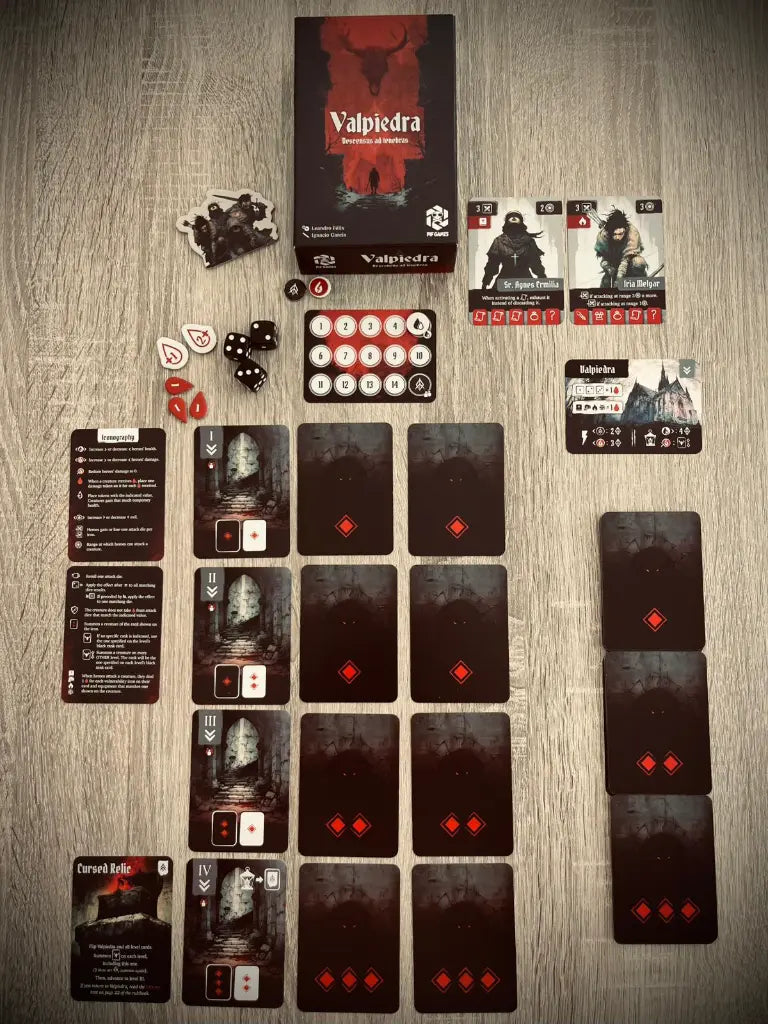 Contenido completo del juego de mesa Valpiedra: caja, tablero de cuevas, enemigos y componentes