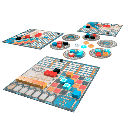 Juego de mesa Azul mostrando tableros individuales y platos con losetas de resina multicolor