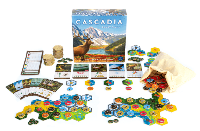 Juego de mesa Cascadia en desarrollo con tableros parciales y bolsa de fichas