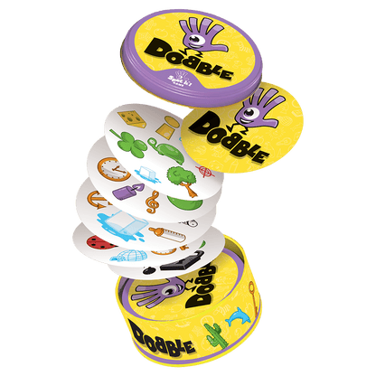 Juego de cartas Dobble en lata amarilla con símbolos coloridos saliendo en cascada