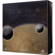 Caja del juego de mesa Dune Imperium con portada estrellada, título dorado e ilustración del planeta Arrakis