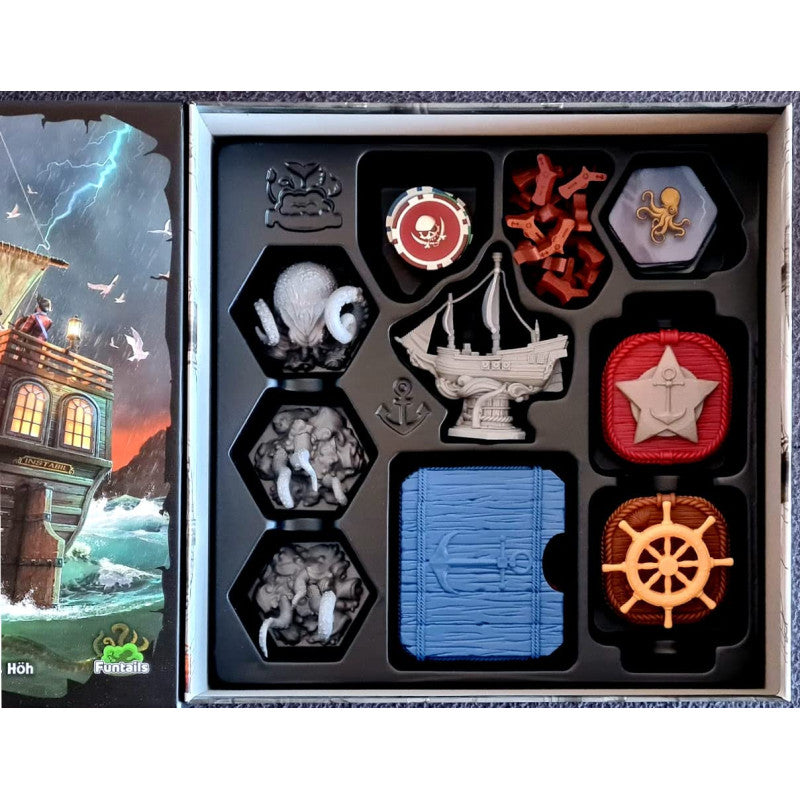 Feed the Kraken Edición Deluxe componentes organizados con miniatura de calamar y barco en caja