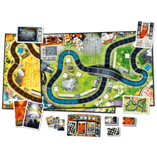 Componentes del juego Heat Lluvia Torrencial con tableros de circuito y cartas