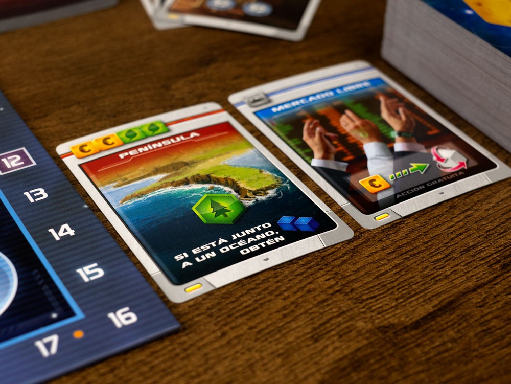 Cartas de acción Península y Mercado Libre con bordes metálicos