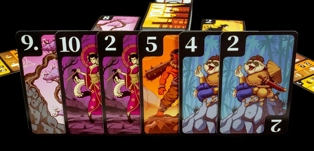 Cartas del juego de mesa Yokai Pagoda Edición Dragón con ilustraciones de yokai y números